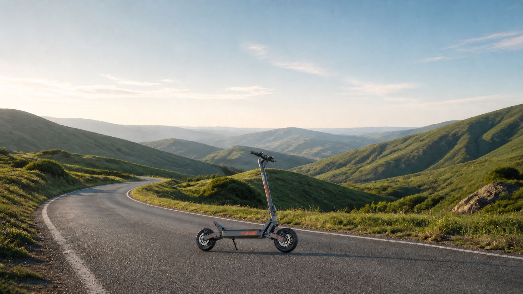 G2 scooter centered on a winding road through rolling green hills
